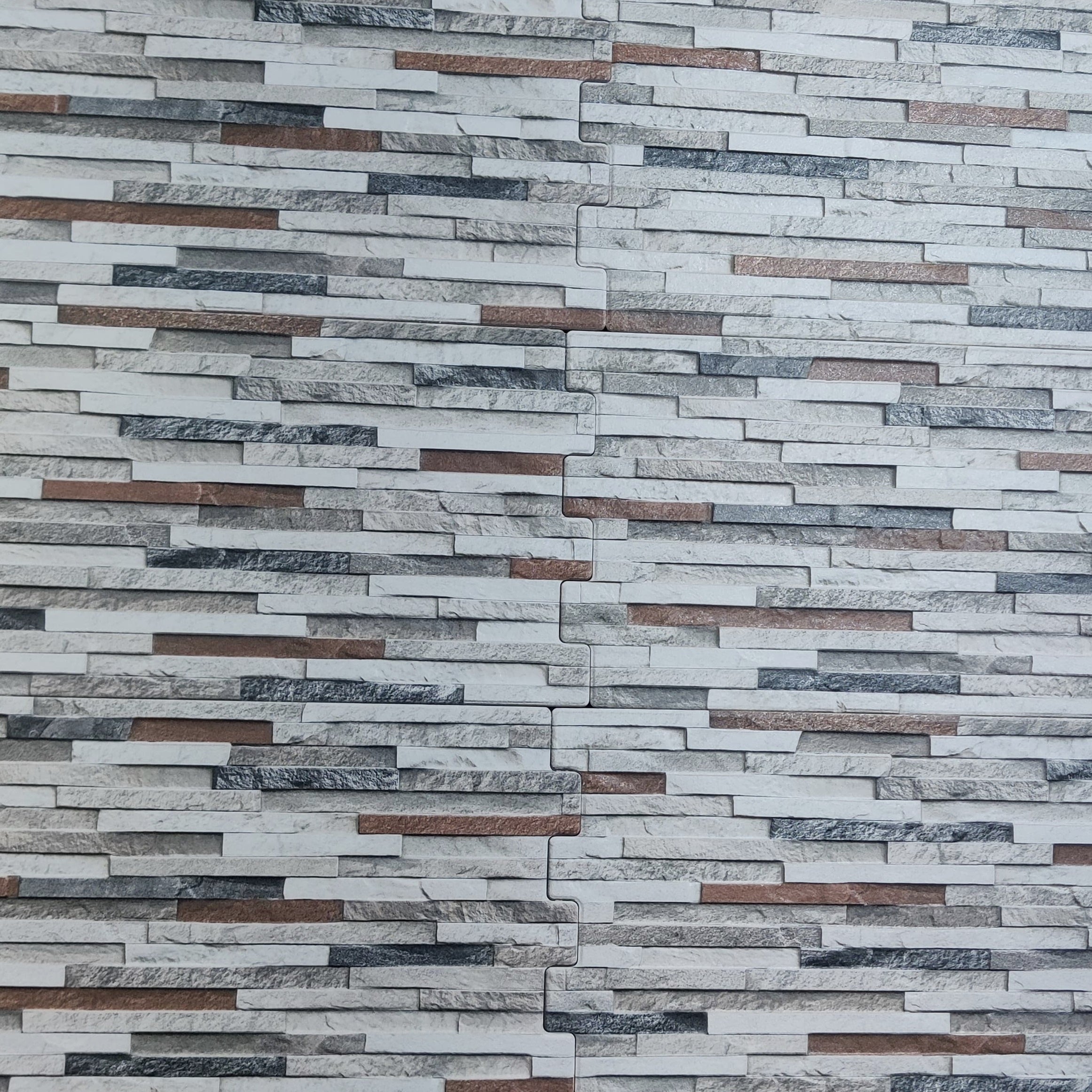 Full wall view of Antarctica Ash Rose porcelain cladding.