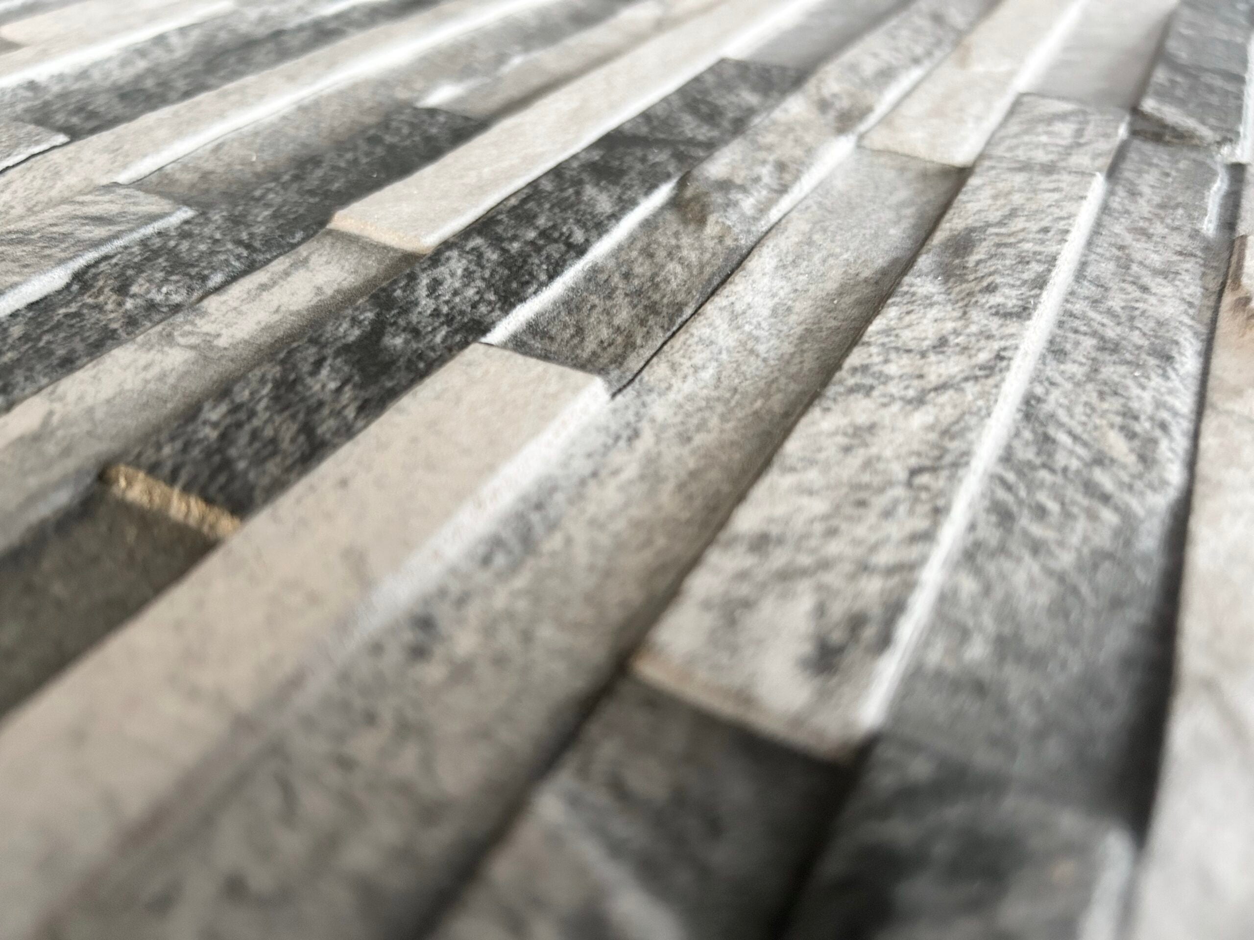 Close-up of textured Shadow Frost composite wall cladding.