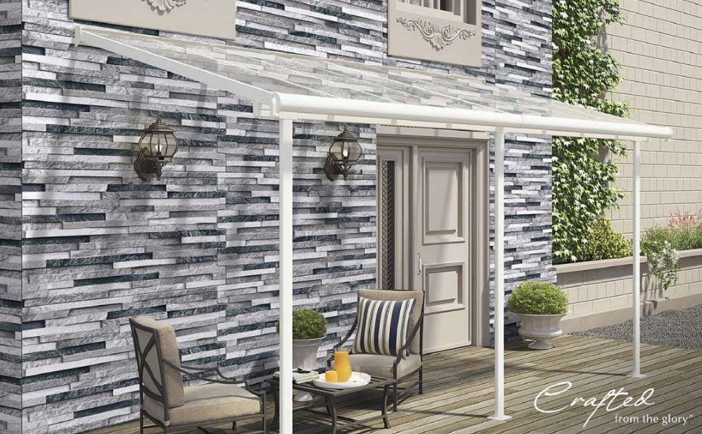 Outdoor scene featuring a wall with Antarctica Shadow Frost porcelain cladding.